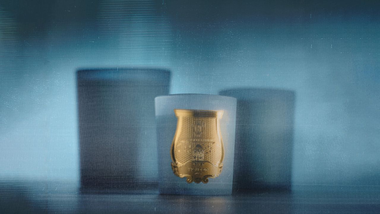 Trudon Versailles blue candle against a blue backdrop