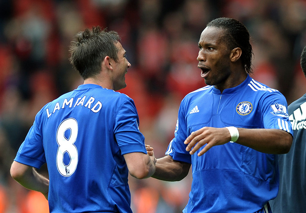 Chelsea's Frank Lampard (L) and Didier Drogba (R) celebrate after the game against Liverpool during the Premiership football match at Anfield in Liverpool on May 2, 2010. Chelsea won the game 2-0.