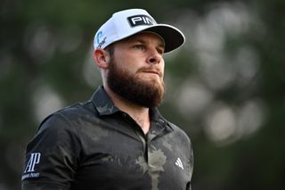Tyrrell Hatton of England waits to hit his second shot on the 17th hole during the third round of the RBC Canadian Open