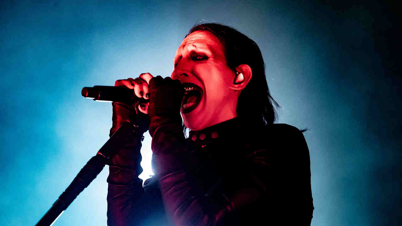 Marilyn Manson performing onstage in 2024