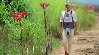 Princess Diana walking through a landmine zone