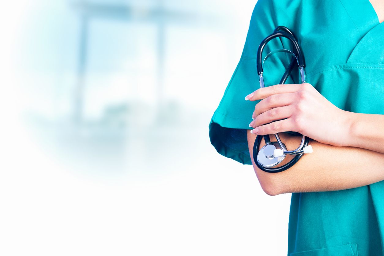 A nurse holding a stethoscope.