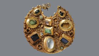The front of one gold earring in the Byzantine style.