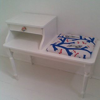 white coloured telephone table