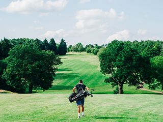 Man walking the golf course