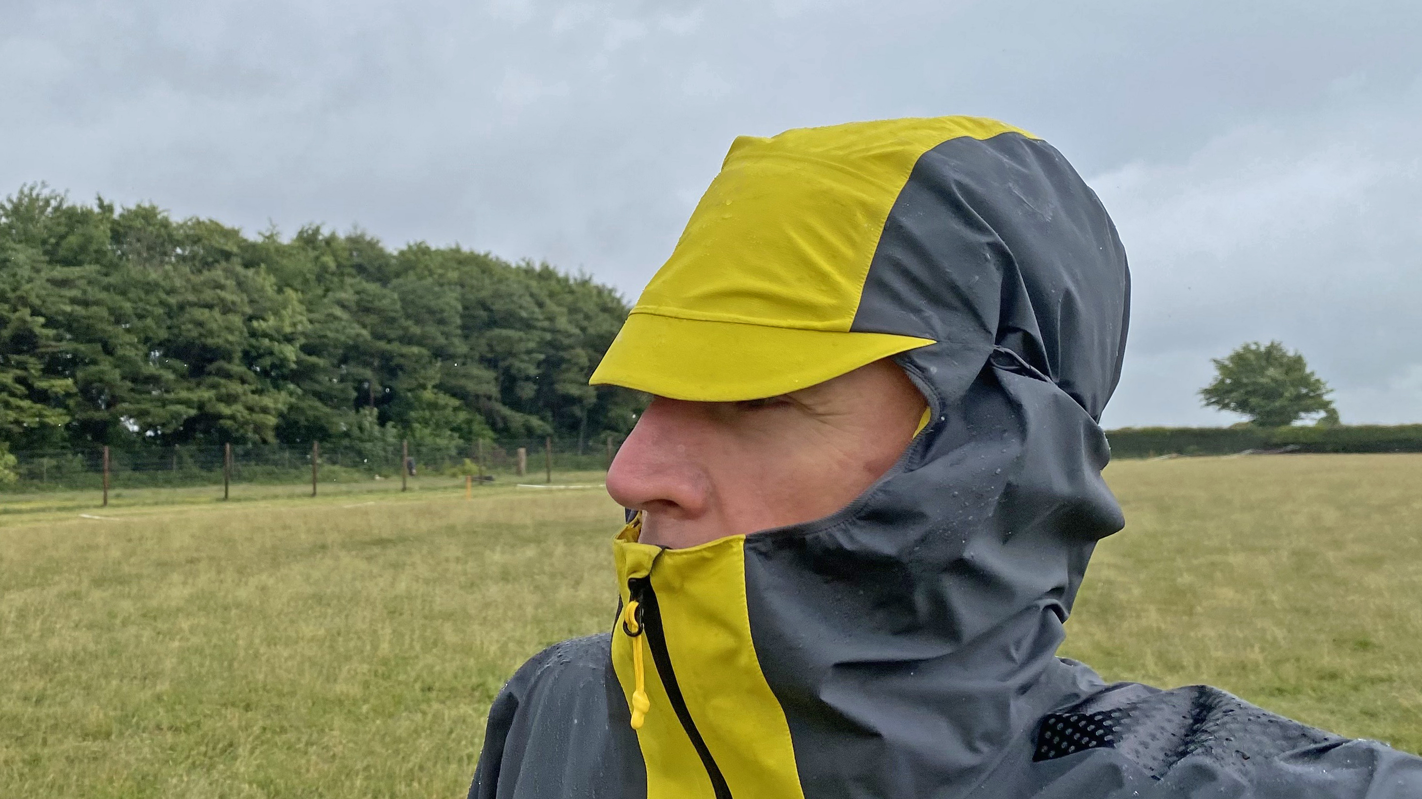 Close up of the Haglofs L.I.M. ZT II GTX with the storm hood in use