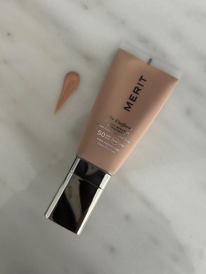 Junior beauty editor Grace Lindsay testing the Merit The Uniform Tinted SPF 50