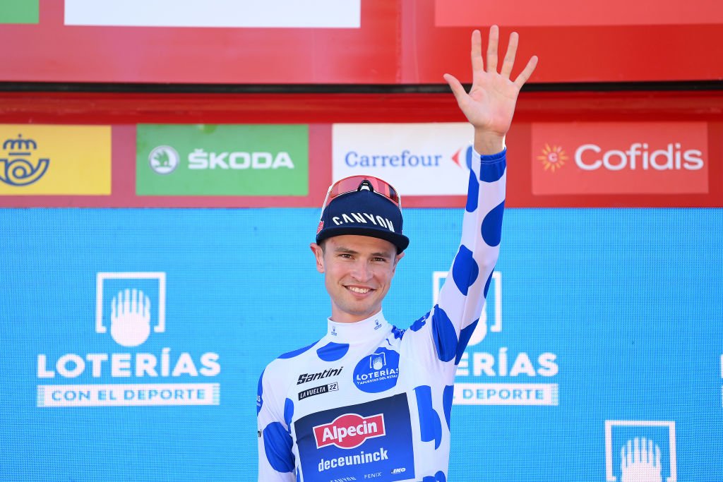 TOMARES SPAIN SEPTEMBER 06 Jay Vine of Australia and Team AlpecinDeceuninck Polka Dot Mountain Jersey celebrates at podium during the 77th Tour of Spain 2022 Stage 16 a 1894km stage from Sanlcar de Barrameda to Tomares LaVuelta22 WorldTour on September 06 2022 in Tomares Spain Photo by Justin SetterfieldGetty Images