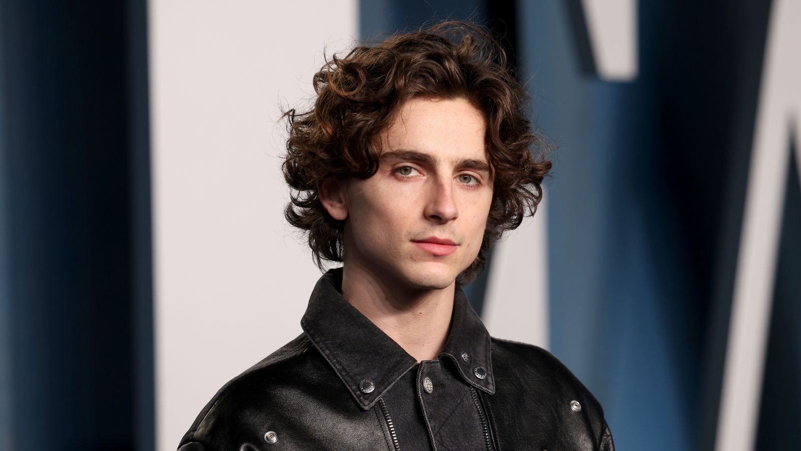 Timothée Chalamet Shows Why Black, Green, and White is The Unexpected Pool Furniture Color Combination Everyone is Embracing in 2026