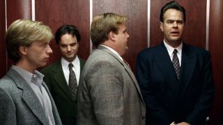 Richard and Tommy looking at Zalinsky in an elevator in Tommy Boy.