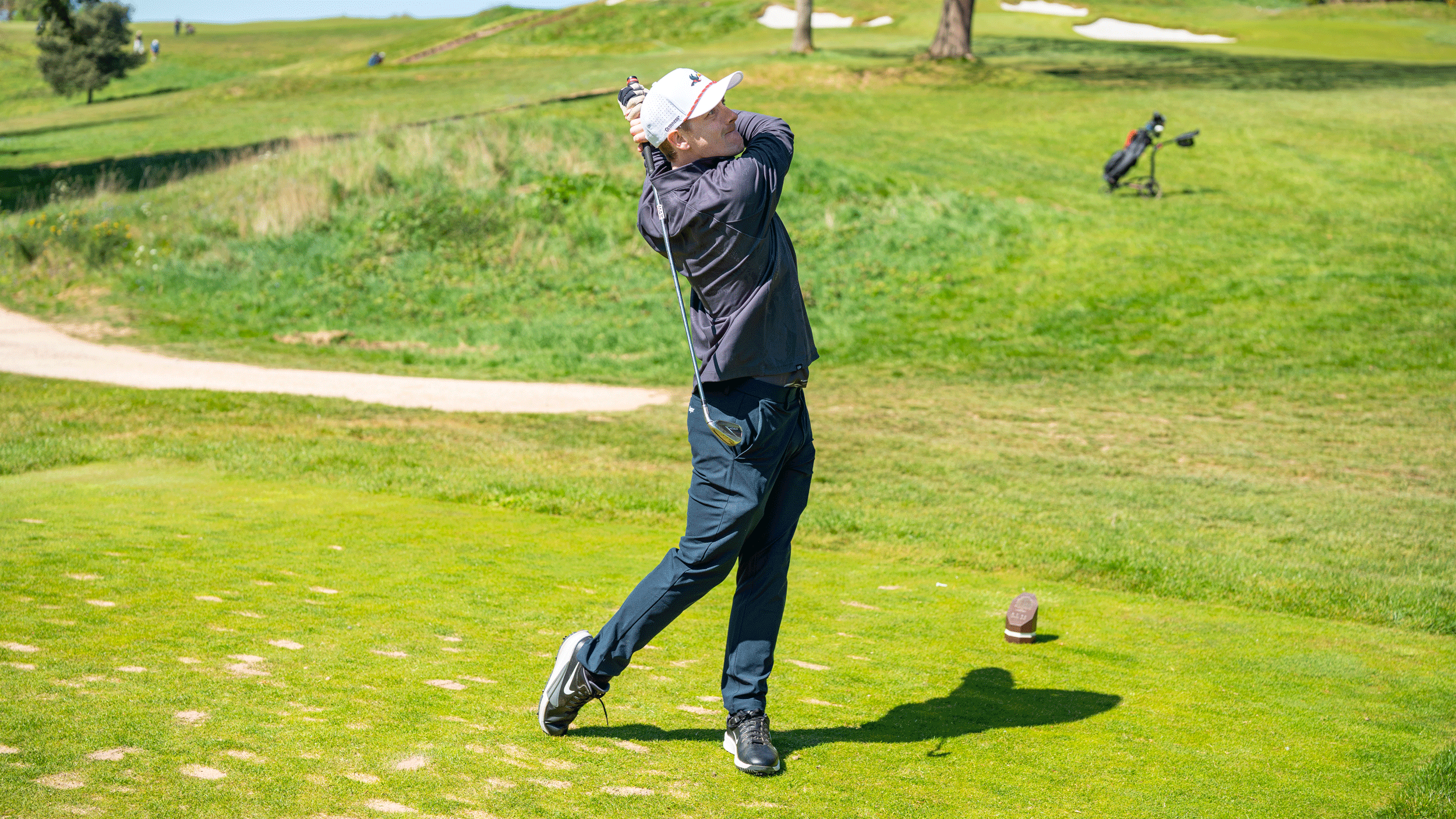 Jonny Leighfield rips a dart right at the flag during Golf Monthly's Spring/Summer Test Day at Tandridge Golf Club