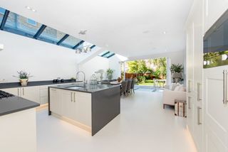 bi-fold doors from kitchen to garden in a project by APT Renovation
