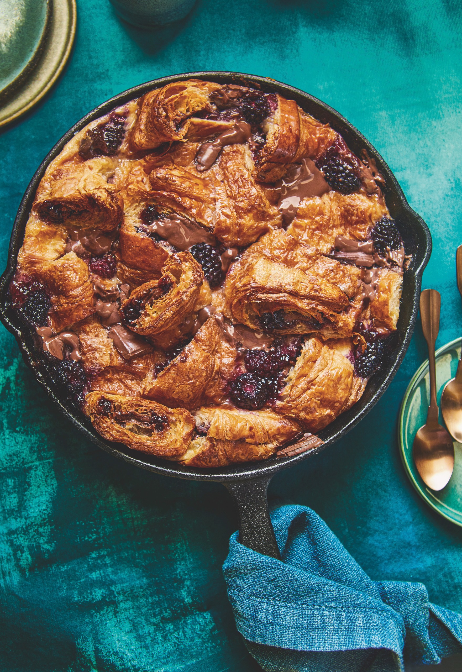 Croissant bread and butter pudding with blackberries