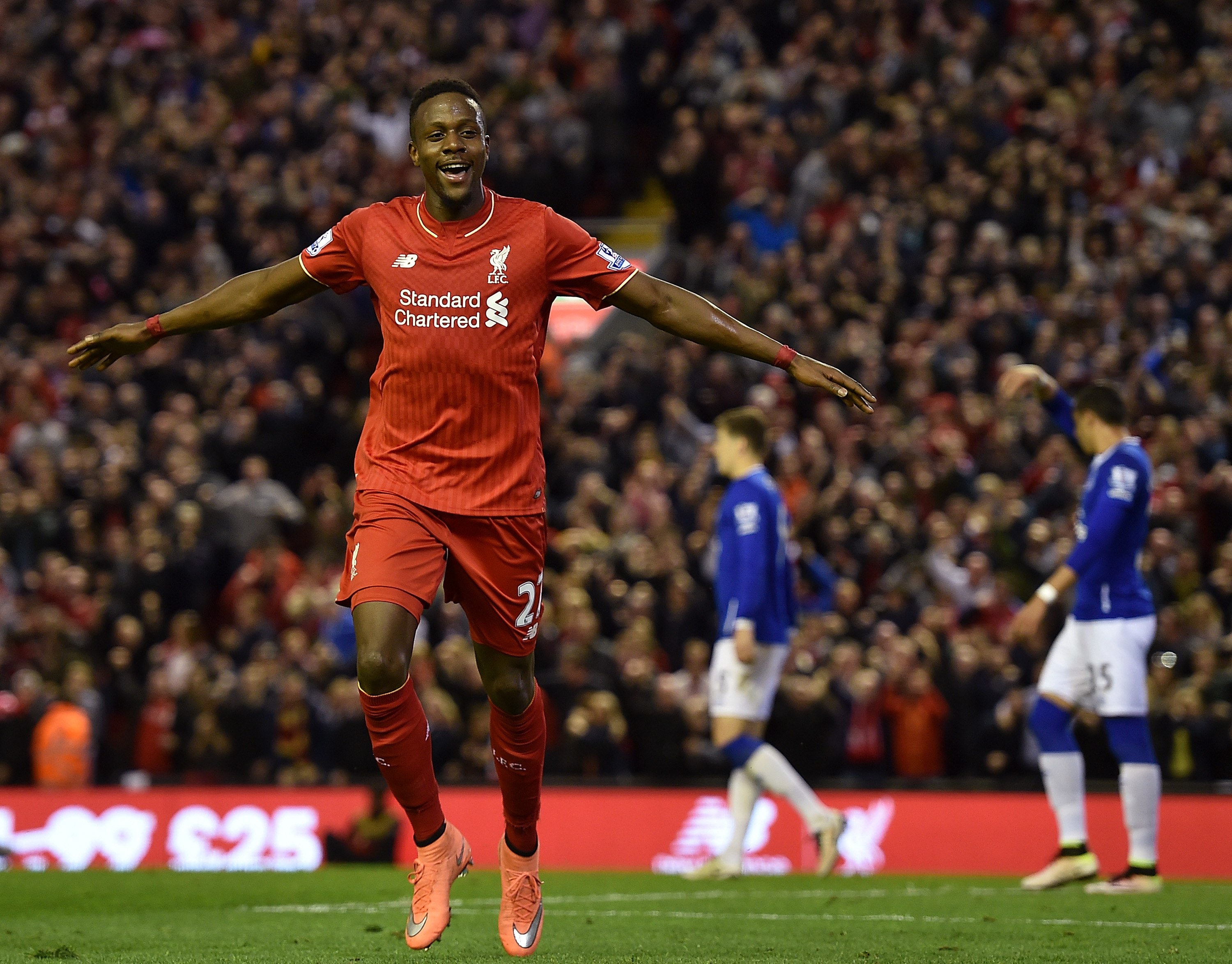 Divock Origi celebrates after scoring for Liverpool against Everton in April 2016.