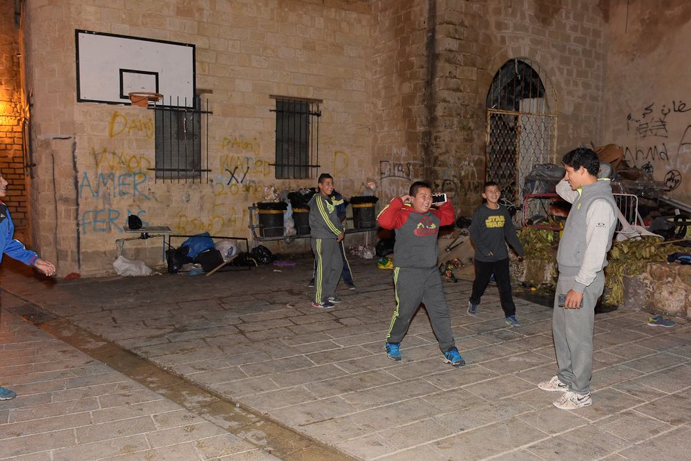 Luis Lemus engages with local children in Akka.