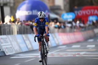 BERGAMO ITALY OCTOBER 09 Remco Evenepoel of Belgium and Team Deceuninck QuickStep crosses the finishing line during the 115th Il Lombardia 2021 a 239km race from Como to Bergamo ilombardia UCIWT on October 09 2021 in Bergamo Italy Photo by Tim de WaeleGetty Images