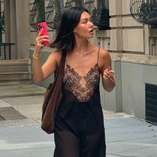 Influencer wears a lace dress