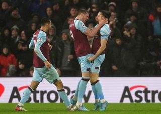 Burnley's Wout Weghorst congratulates Jay Rodriguez, right, on his equaliser