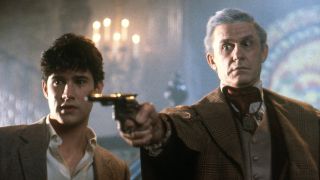 william ragsdale Roddy McDowall on the right with a gun fright night