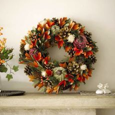 An autumn wreath on a mantelpiece