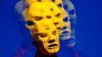 Eloy Casagrande Slipknot white mask blurred image