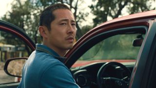 Danny (Steven Yeun) getting out of his truck in Beef