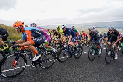 Riders compete at the Tour of Britain in 2022