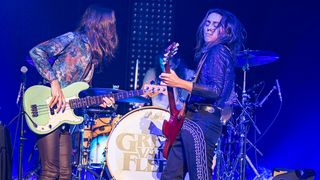 (L-R) Musicians Sam Kiszka, Danny Wagner, and Jake Kiszka of Greta Van Fleet perform on stage at Cal Coast Credit Union Open Air Theatre on September 29, 2019 in San Diego, California