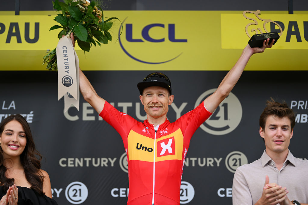 PAU, FRANCE - JULY 12: Magnus Cort of Denmark and Team Uno-X Mobility celebrates at podium as most combative rider prize winner during the 111th Tour de France 2024, Stage 13 a 165.3km stage from Agen to Pau / #UCIWT / on July 12, 2024 in Pau, France. (Photo by Dario Belingheri/Getty Images)