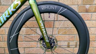 The HUNT 60 Limitless UD Carbon Spoke Disc Wheelset on a Specialized SL7 road bike