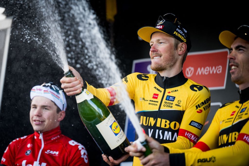 Dutch Dylan Van Baarle of JumboVisma celebrates on the podium after winning the 78th edition of the mens oneday cycling race Omloop Het Nieuwsblad 2073 km from Gent to Ninove Saturday 25 February 2023 BELGA PHOTO JASPER JACOBS Photo by JASPER JACOBS BELGA MAG Belga via AFP Photo by JASPER JACOBSBELGA MAGAFP via Getty Images
