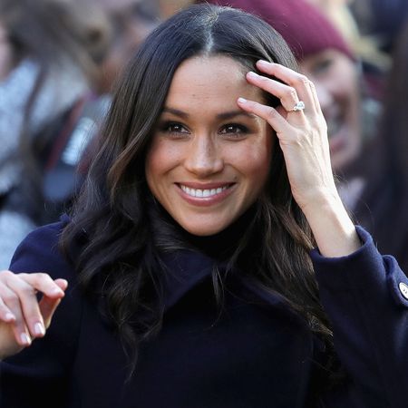 Meghan Markle shows off her engagement ring from Prince Harry.