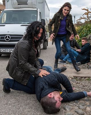 Moira Dingle recklessly heads out to get in the van and Cain Dingle goes after her but fails to stop her from setting off. Seeing the danger before him Pete Barton rushes to push Jacob Gallagher out of the way of the vehicle but ends up being knocked down himself in Emmerdale.
