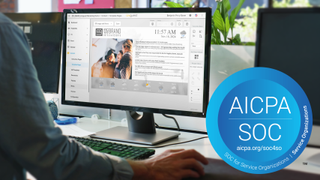 The Uniguest platform on a laptop being used by a male employee at work.