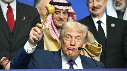 President Donald Trump gavels out inaugural Board of Peace meeting