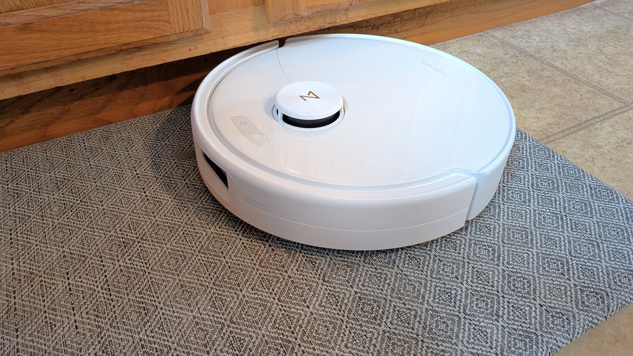 Roborock Qrevo 2 Pro cleaning under edge of furniture