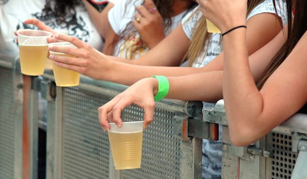 teens with cups of beer