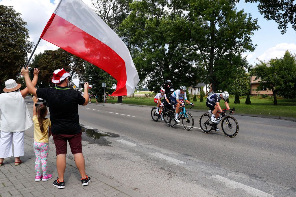 CHELM POLAND AUGUST 09 LR Michal Paluta of Poland and Team Poland Reprezentacja Polski Yevgeniy Fedorov of Kazakhstan and Team Astana Premier Tech Sean Bennett of The United States and Team Qhubeka Nexthash in the Breakaway during the 78th Tour de Pologne 2021 Stage 1 a 216km stage from Lublin to Chem 212m TourdePologne TDP2021 UCIWT on August 09 2021 in Chelm Poland Photo by Bas CzerwinskiGetty Images