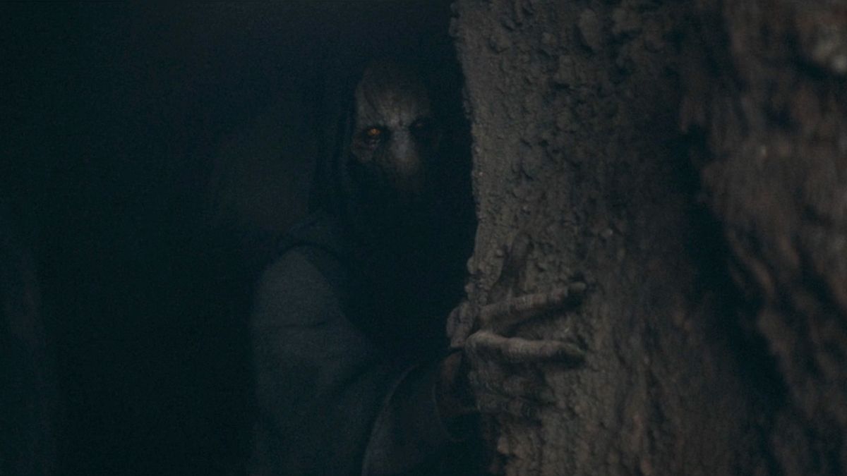 Darth Plagueis hiding in the shadows of a cave