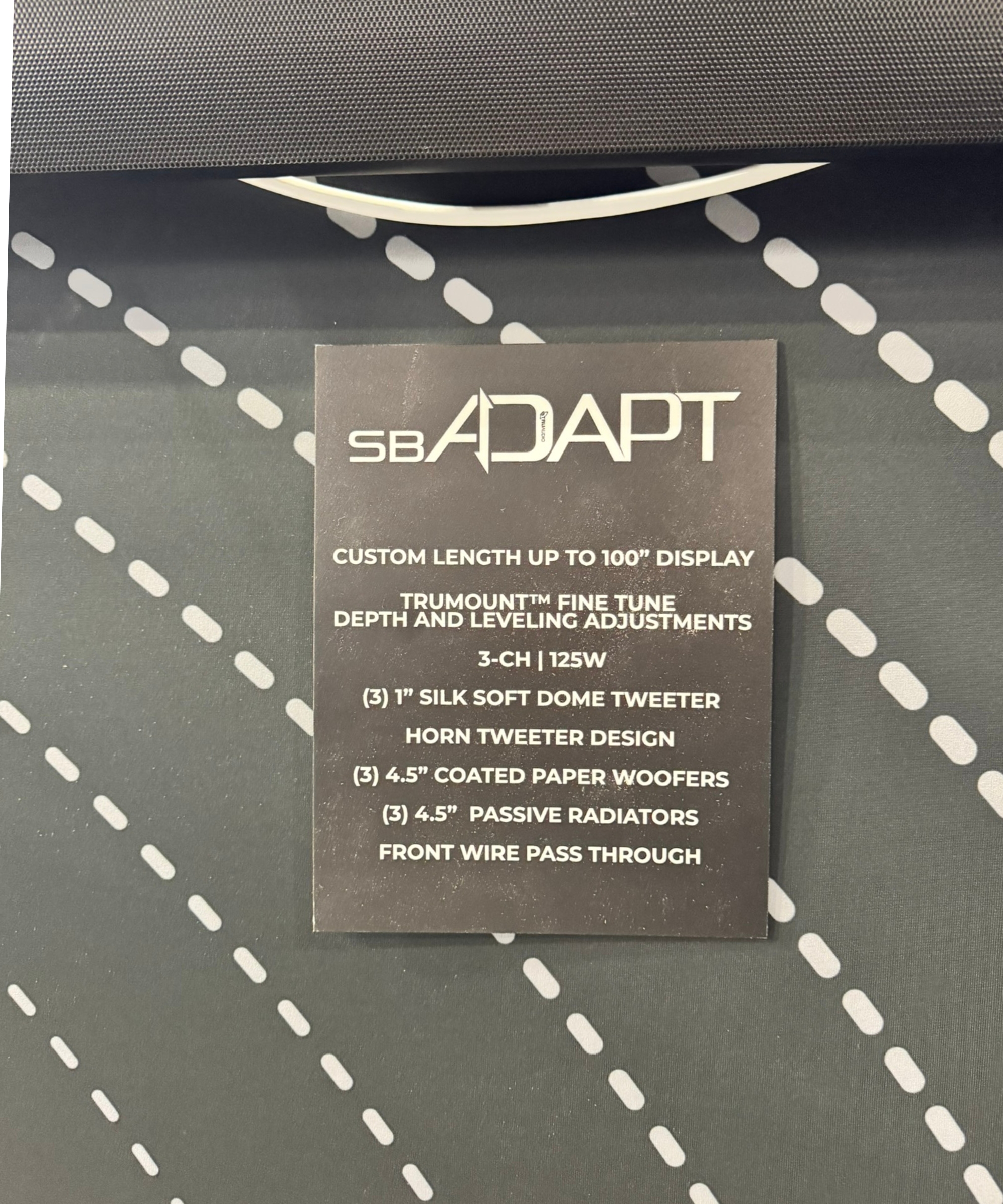 Information on the SB-ADAPT soundbar from TruAudio, showing specs including length, depth, and speaker design.