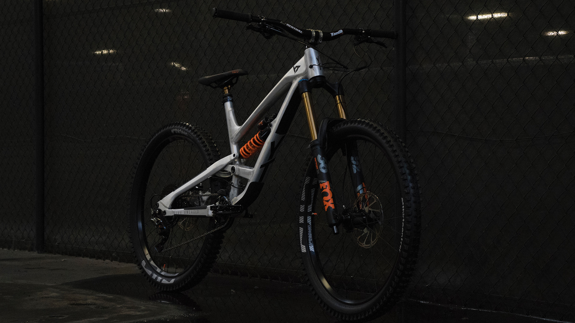 Full suspension mountain bike in a garage