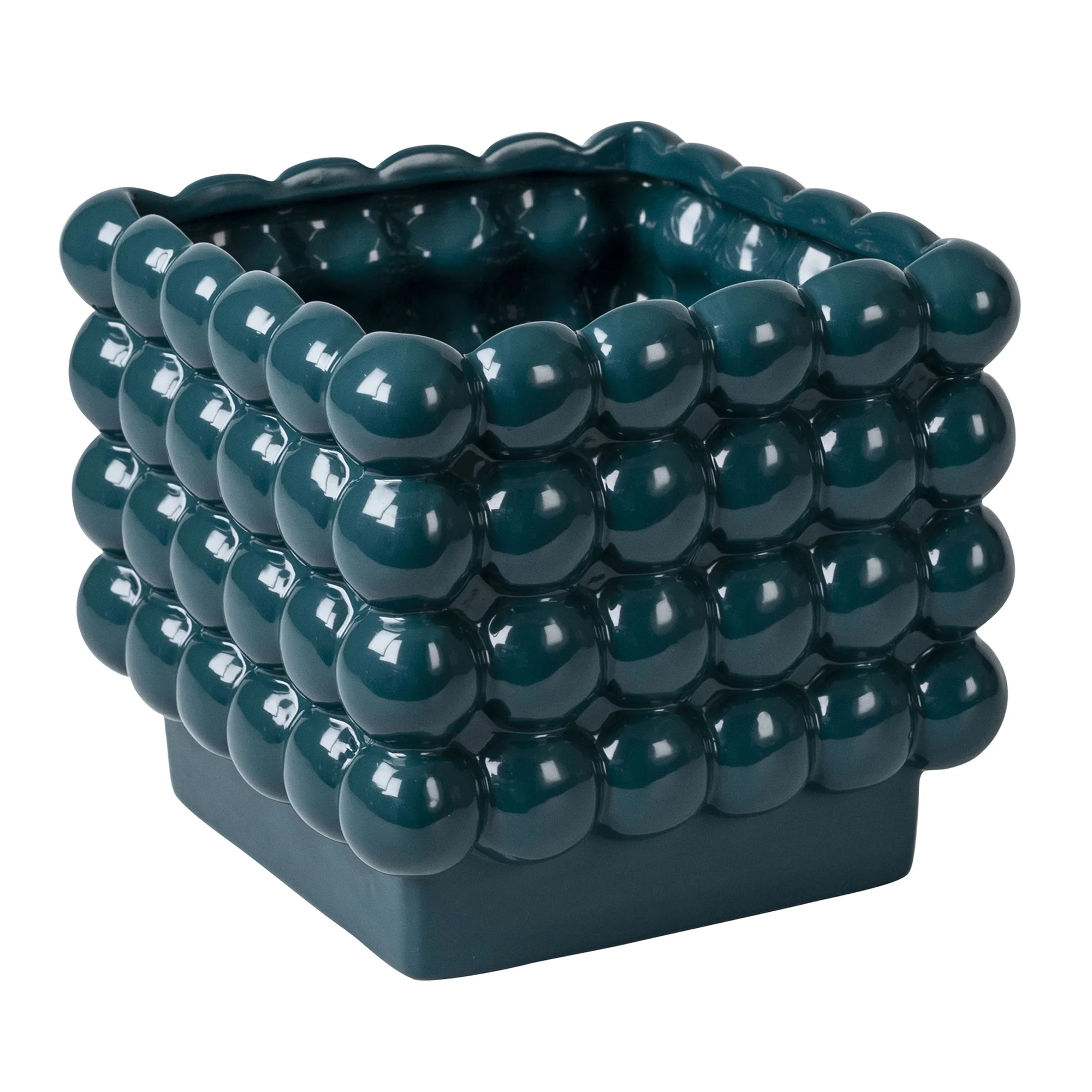 teal ceramic planter with dot pattern