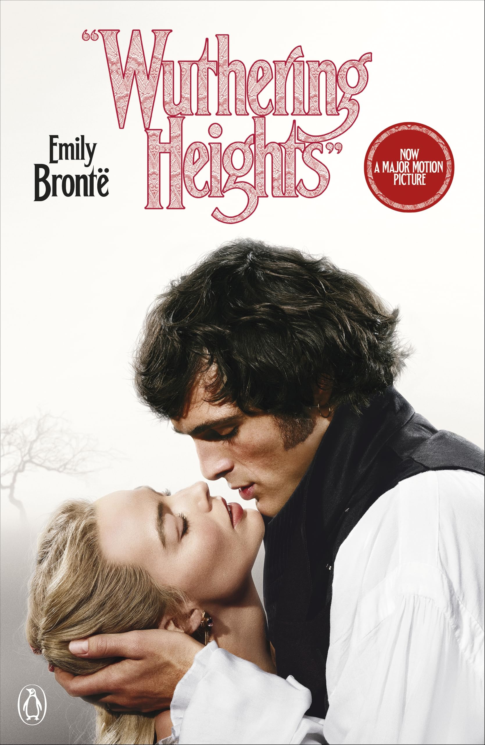 A book cover for Emily Bront&amp;euml;'s Wuthering Heights features a close-up of a man and woman in period clothing leaning in for a kiss against a stark white background with a &amp;quot;Now a Major Motion Picture&amp;quot; seal.