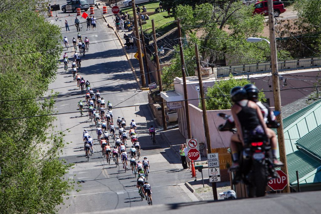 Riders string out coming off of the backside descent