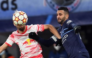 Riyad Mahrez battles for the ball