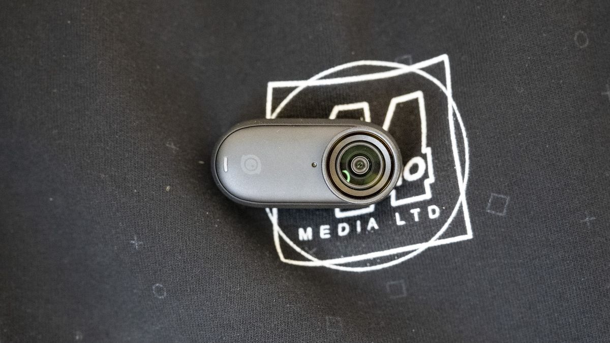 Insta360 Go 3S camera attached to a sweater magnetically