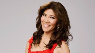 Julie Chen Moonves posing for the camera