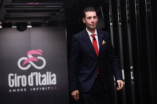 Former two-time winner of the Giro d'Italia, Vincenzo Nibali walks on stage at the 2018 route presentation