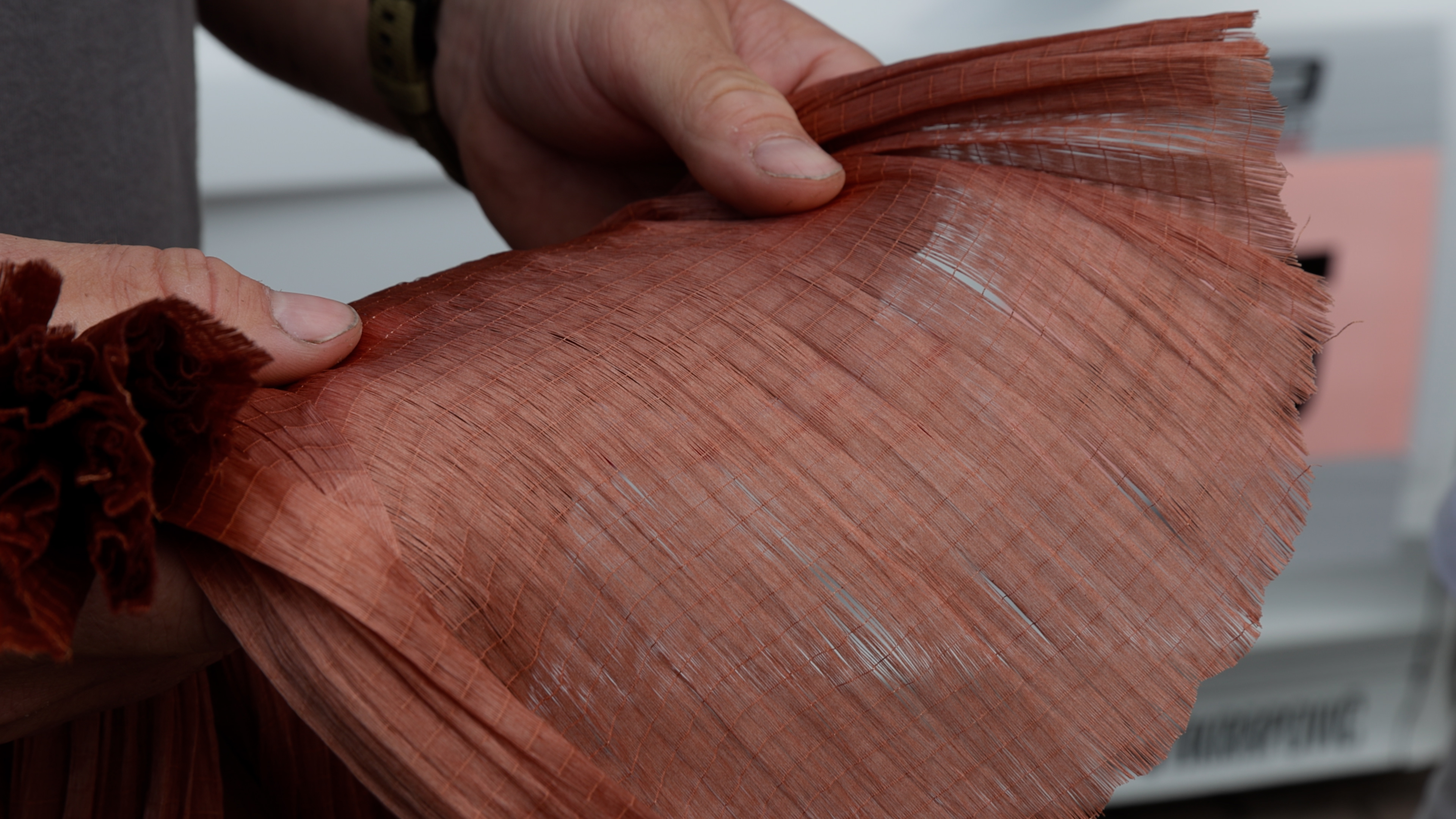 red tyre casing in a hand