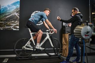 Grant Bayton working with Simon Fellows to adjust the fit of Simon's bike